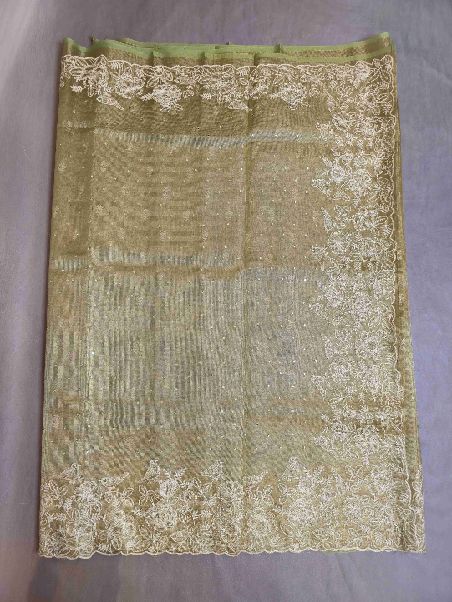 Semi kota tissue saree with embroidered borders