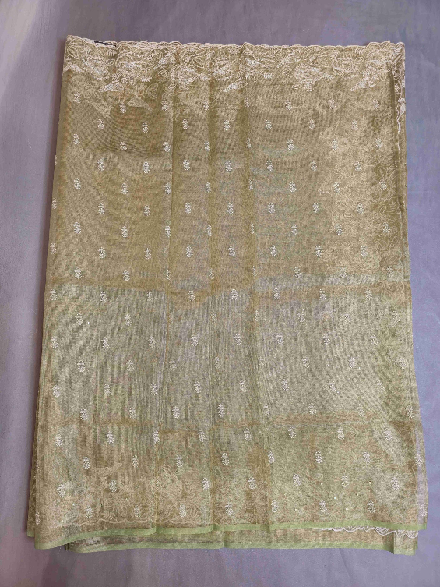 Semi kota tissue saree with embroidered borders